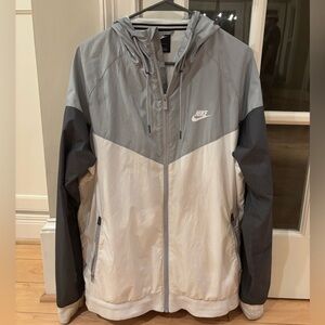 Large gray and white nike windbreaker